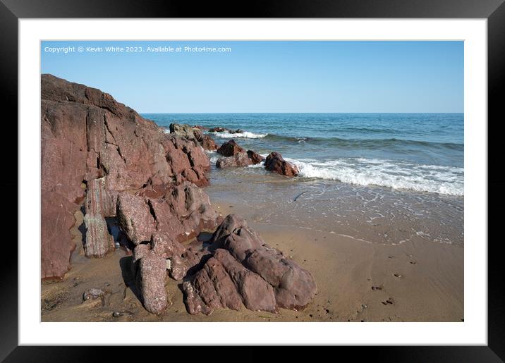 Millions of years old rocks at end of Freshwater East beach Framed Mounted Print by Kevin White