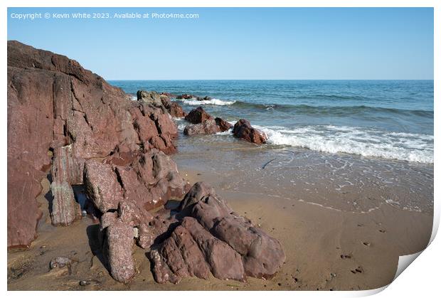 Millions of years old rocks at end of Freshwater East beach Print by Kevin White