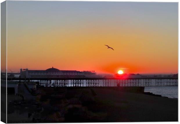 Sunrise over Palace Pier Brighton  Canvas Print by Beryl Curran