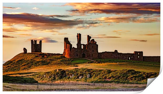 A Timeless Fortress: Dunstanburgh Castle Print by Trevor Camp