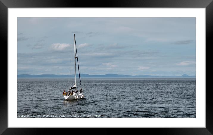 Solitary Sail: A Serene Encounter Framed Mounted Print by Tom McPherson