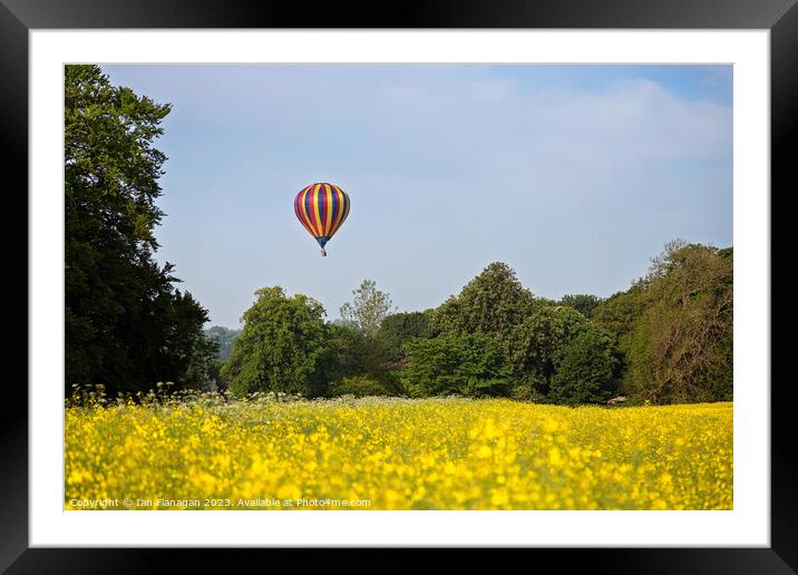 "Serenity Soaring: Hot Air Balloon Gracefully Floa Framed Mounted Print by Ian Flanagan