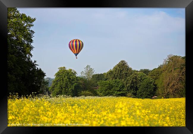 "Serenity Soaring: Hot Air Balloon Gracefully Floa Framed Print by Ian Flanagan