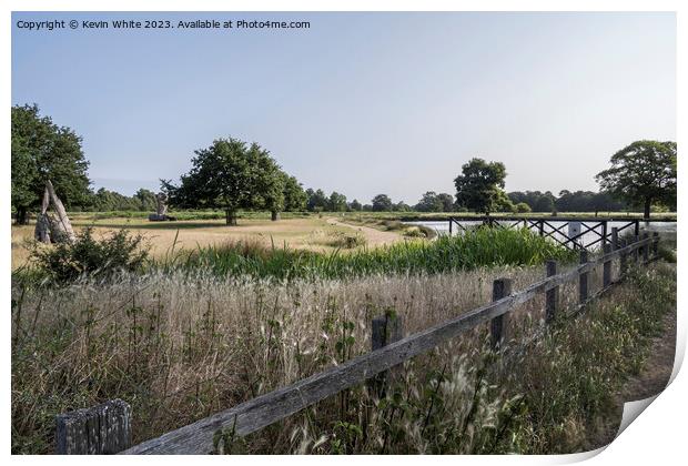 July view of Bushy park pond from carpark Print by Kevin White