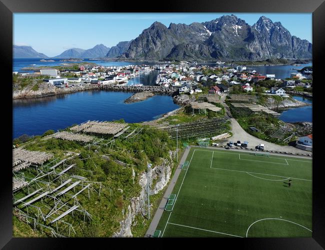 Aerial view of fishing village and football field on Lofoten Islands in Norway Framed Print by Irena Chlubna