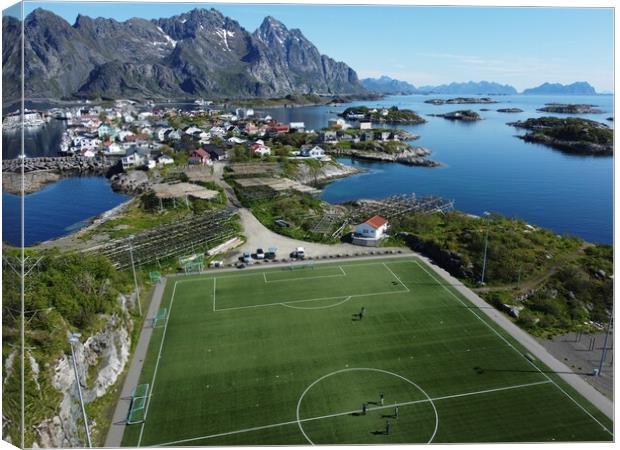 Aerial view of fishing village and football field on Lofoten Islands in Norway Canvas Print by Irena Chlubna