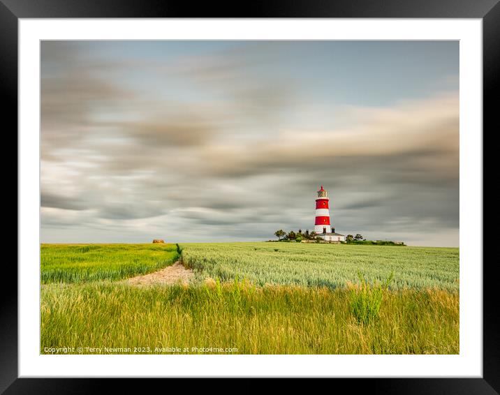 Happisburgh Lighthouse with a dramatic sky Framed Mounted Print by Terry Newman