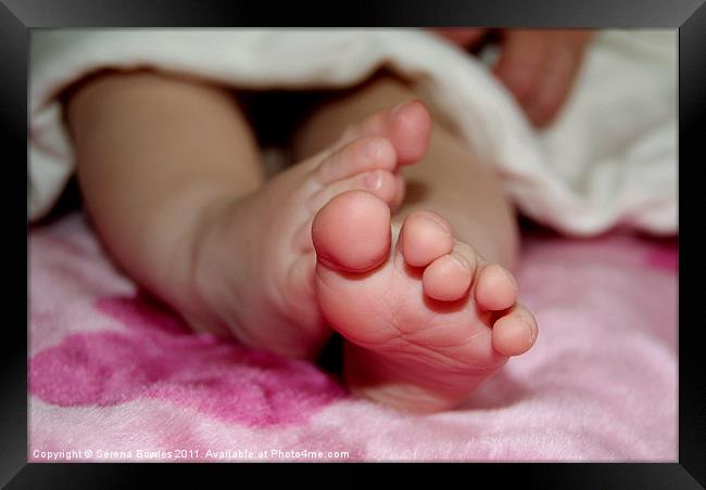 Delicate Baby's Foot Framed Print by Serena Bowles