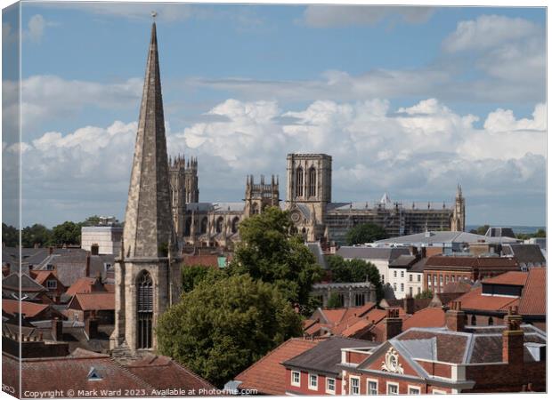 York Minster over the Rooftops. Canvas Print by Mark Ward