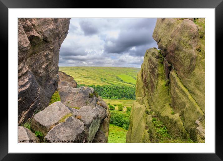 Looking through Ramshaw Rockes Framed Mounted Print by Alan Dunnett