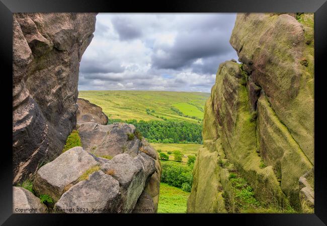 Looking through Ramshaw Rockes Framed Print by Alan Dunnett