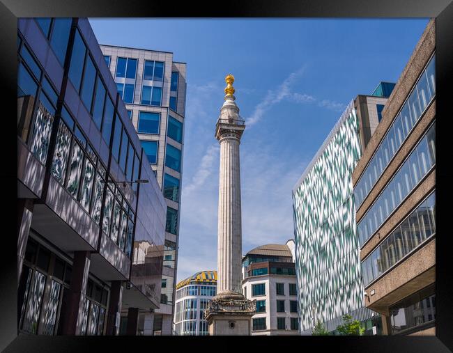 Modern office buildings surround the Monument in L Framed Print by Steve Heap
