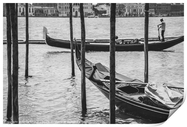 A gondolier or venetian boatman propelling a gondola on Grand Canal in Venice. Black and white photography. Print by Cristi Croitoru