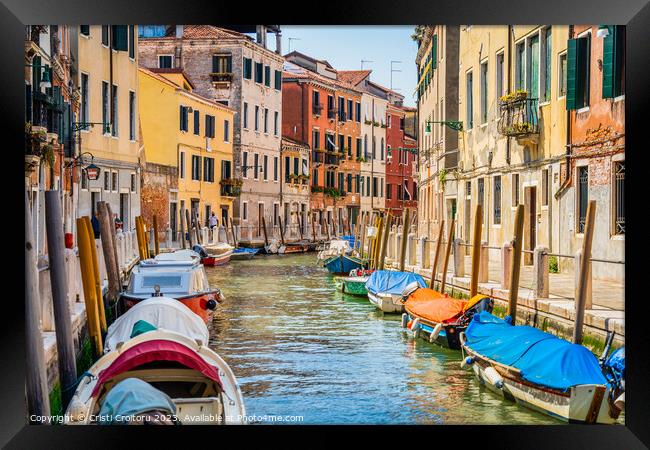 Narrow water canals in Venice. Framed Print by Cristi Croitoru