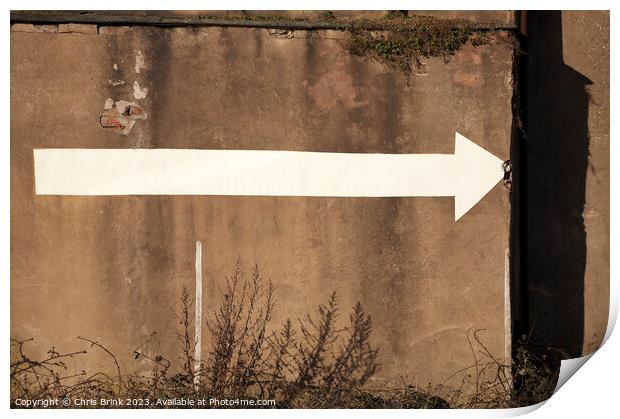 Abstract arrow painted on old wall Print by Chris Brink