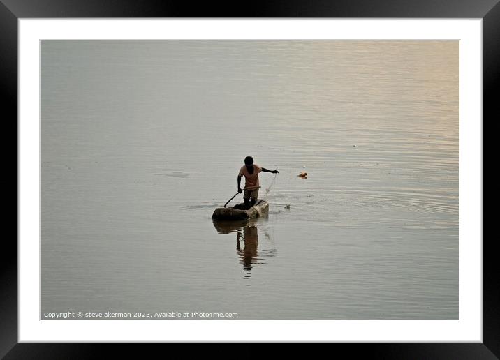 Tribesman fishing on the Luangwa river Zambia Framed Mounted Print by steve akerman