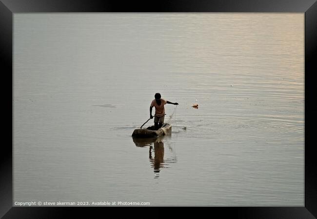 Tribesman fishing on the Luangwa river Zambia Framed Print by steve akerman
