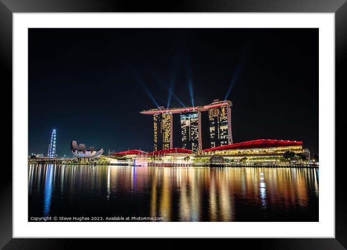 Marian Bay Sands hotel in red lights Framed Mounted Print by Steve Hughes