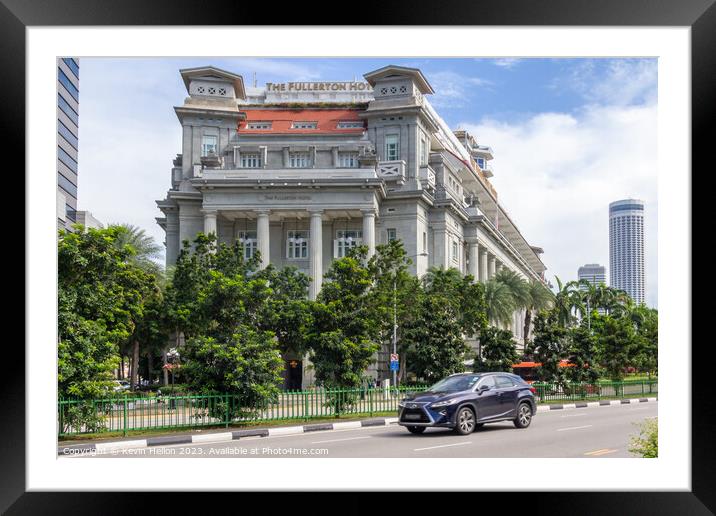 Car driving past the Fullerton Hotel  Framed Mounted Print by Kevin Hellon
