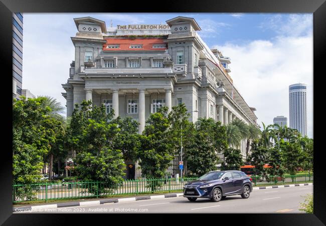 Car driving past the Fullerton Hotel  Framed Print by Kevin Hellon