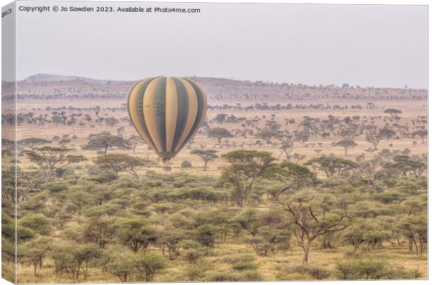 Early Morning Balloon Flight  over the Serengeti Canvas Print by Jo Sowden