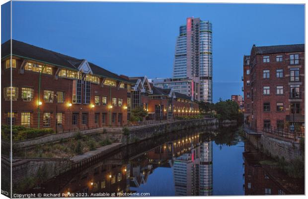 River Aire Reflections In Leeds Canvas Print by Richard Perks