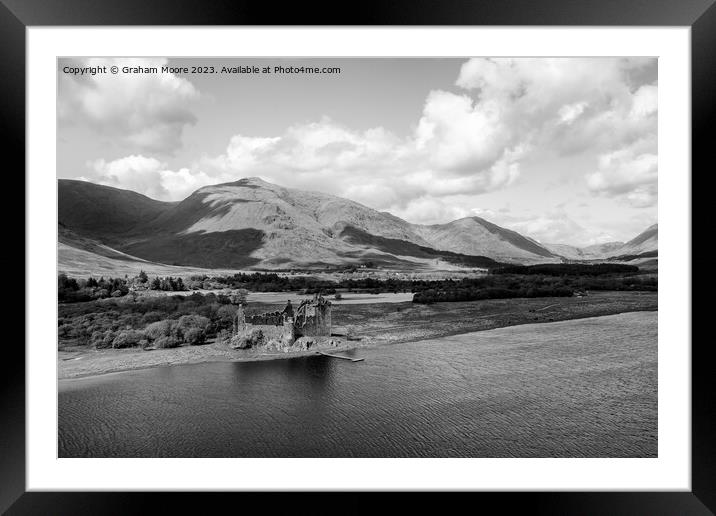 Kilchurn Castle elevated view monochrome Framed Mounted Print by Graham Moore