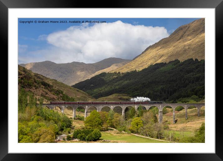 Steam train crossing Glenfinnan viaduct Framed Mounted Print by Graham Moore