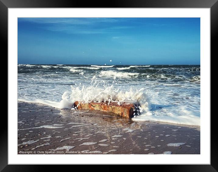 Wave hitting bricks at the beach Framed Mounted Print by Chris Spalton