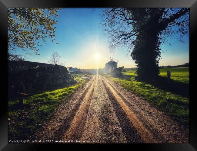 Country lane at Sunset Framed Print by Chris Spalton