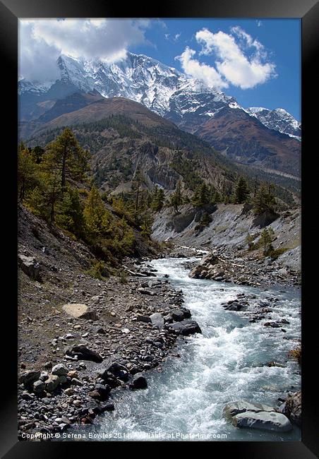 River and Mountains en route to Manang Framed Print by Serena Bowles