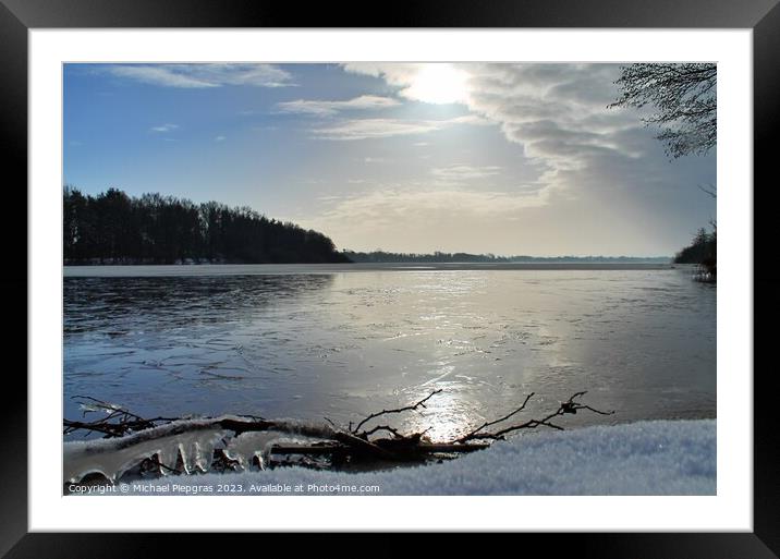 Beautiful winter shot at a lake and forest with snow and ice. Framed Mounted Print by Michael Piepgras