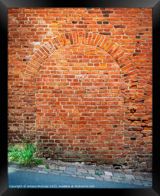 Bricked Up Doorway Arch Framed Print by Antony McAulay