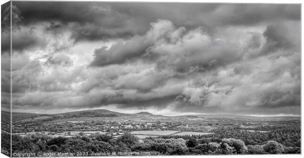 Thunder clouds over Dartmoor Canvas Print by Roger Mechan