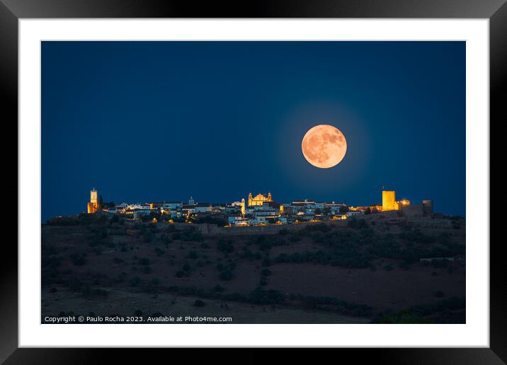 Night landscape of Monsaraz, Portugal, with a full moon Framed Mounted Print by Paulo Rocha