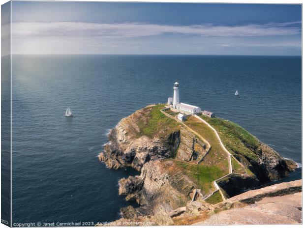 Sailing the Serene Seas at South Stack Canvas Print by Janet Carmichael
