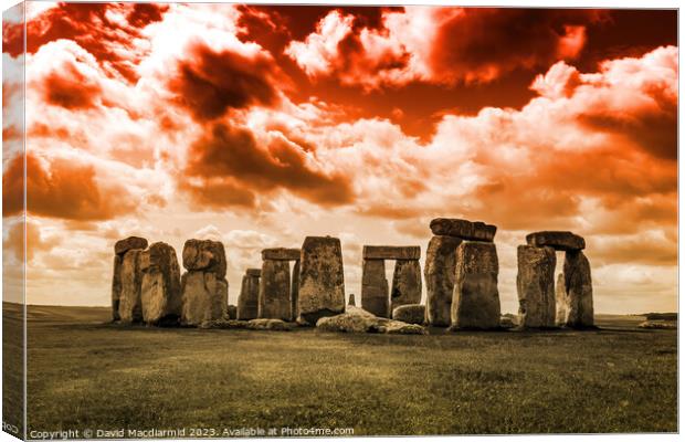 Stonehenge Fire In The Sky Canvas Print by David Macdiarmid