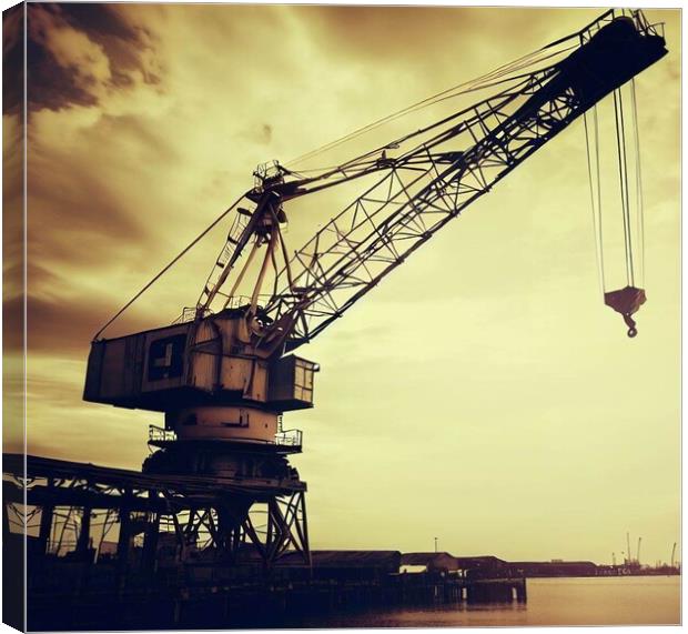 A old crane next to the docks  Canvas Print by Paddy 