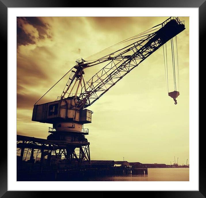 A old crane next to the docks  Framed Mounted Print by Paddy 