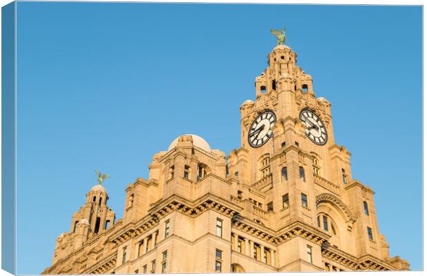 Liver birds dominating the Liverpool skyline Canvas Print by Jason Wells