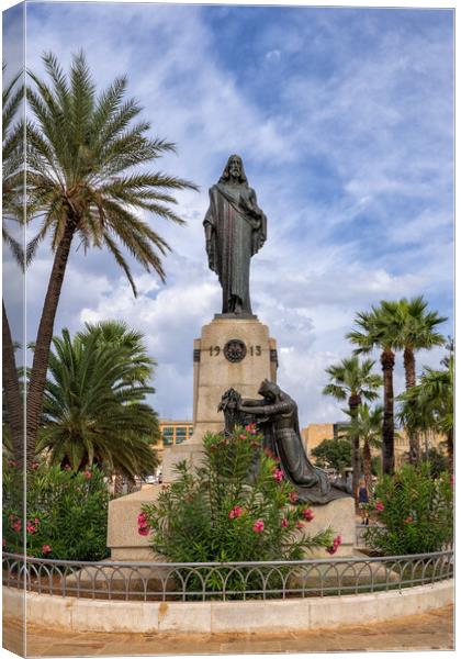 Christ the King Monument in Malta Canvas Print by Artur Bogacki