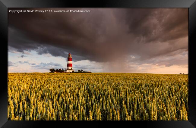 Evening Rain Shower Over Happisburgh Lighthouse Framed Print by David Powley