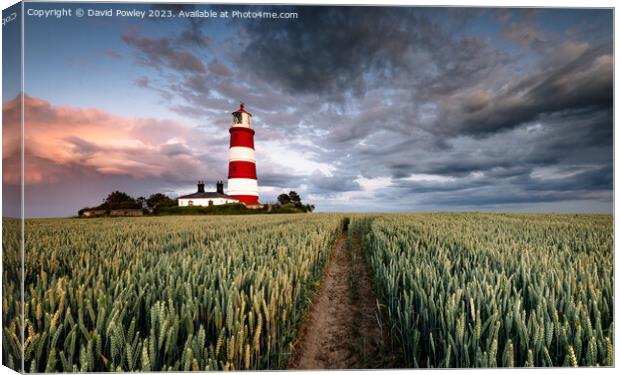Evening Clouds Over Happisburgh Lighthouse Canvas Print by David Powley