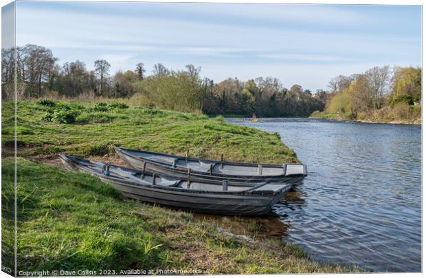 Small fishing boats beached by the River Tweed in Kelso, Scottish Borders, UK Canvas Print by Dave Collins