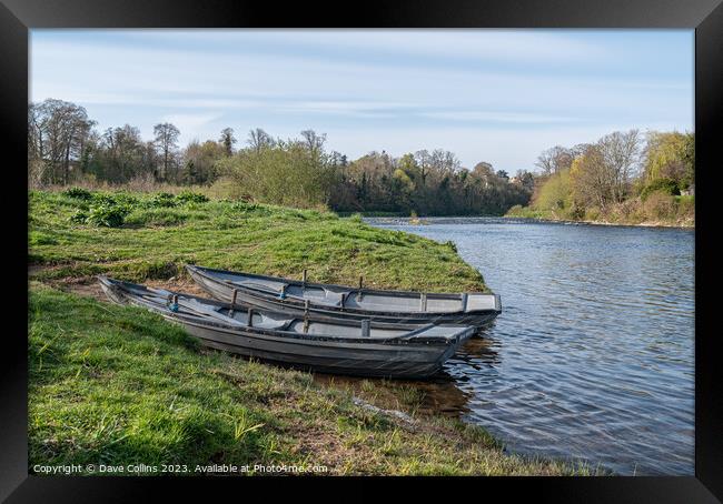 Small fishing boats beached by the River Tweed in Kelso, Scottish Borders, UK Framed Print by Dave Collins