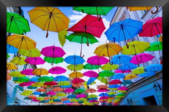 A colorful umbrella Framed Print by M. J. Photography