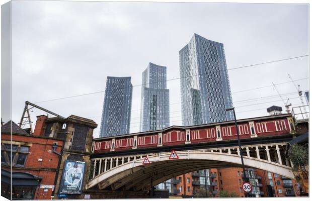 Deansgate Square above a red railway bridge Canvas Print by Jason Wells