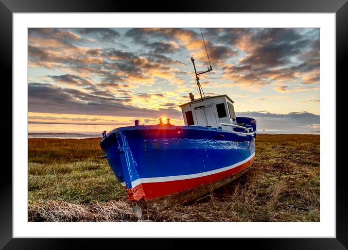 Fishing boat at sunset Framed Mounted Print by Ian Homewood