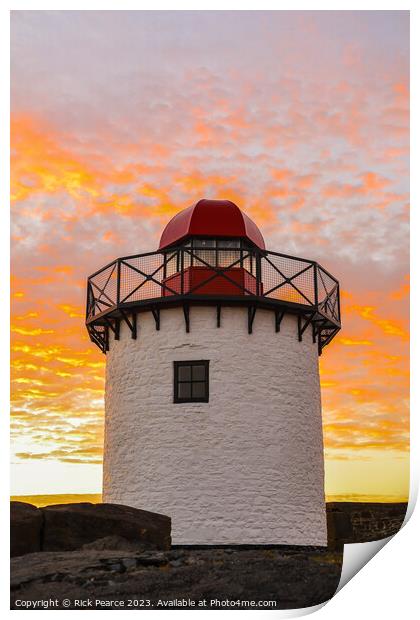 Bury port lighthouse at sunset Print by Rick Pearce