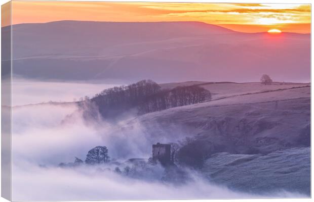 Peveril Castle at sunrise over fog. Peak District Canvas Print by John Finney